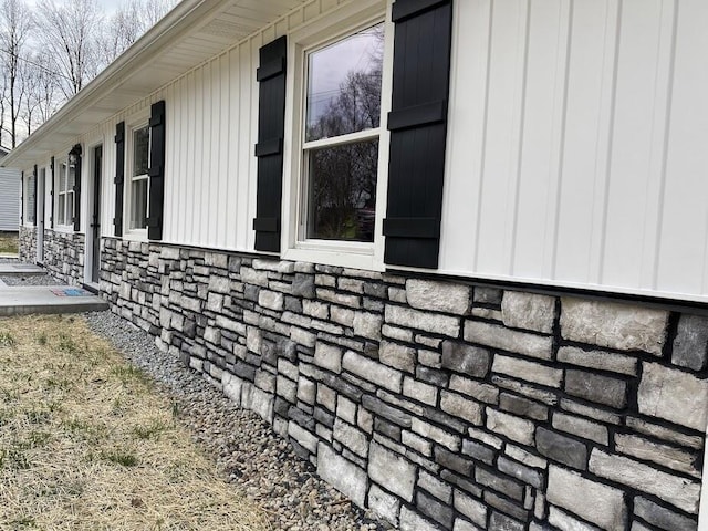 view of home's exterior with stone siding