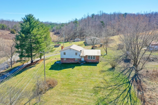 drone / aerial view with a forest view