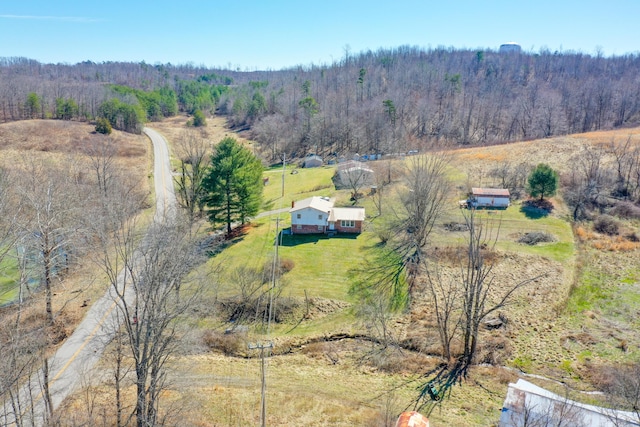 aerial view featuring a rural view and a forest view