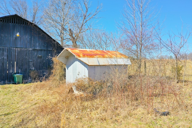 view of outbuilding featuring an outdoor structure