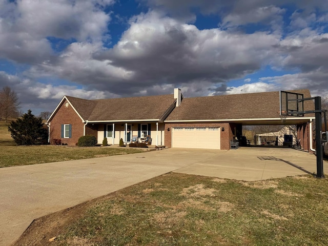 single story home featuring brick siding, a porch, concrete driveway, a garage, and a front lawn