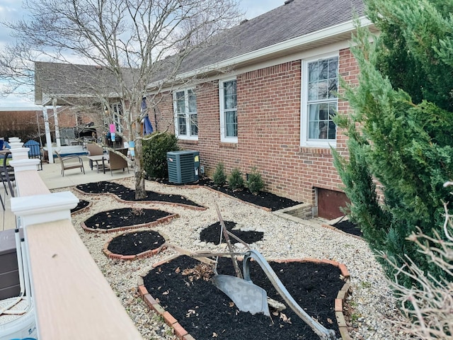 view of patio / terrace with central AC