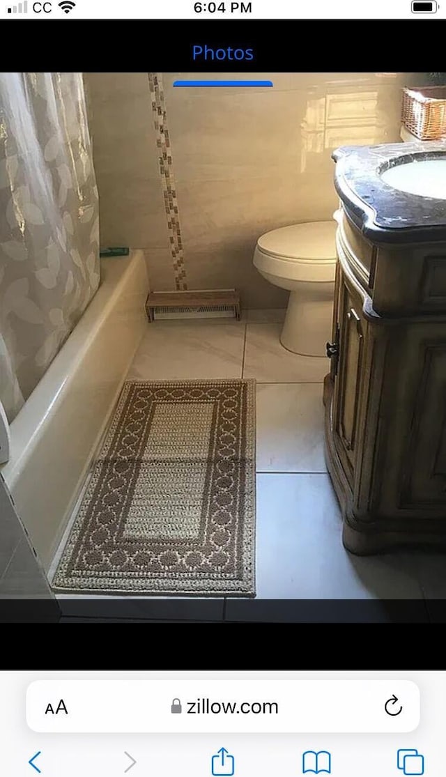 149 Cherokee Ave, Russell Springs, KY 42642 - full bath featuring toilet, vanity, and shower / bathtub combination with curtain