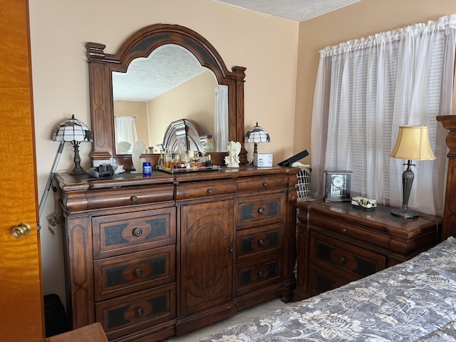 149 Cherokee Ave, Russell Springs, KY 42642 - bedroom with light tile patterned floors and a textured ceiling