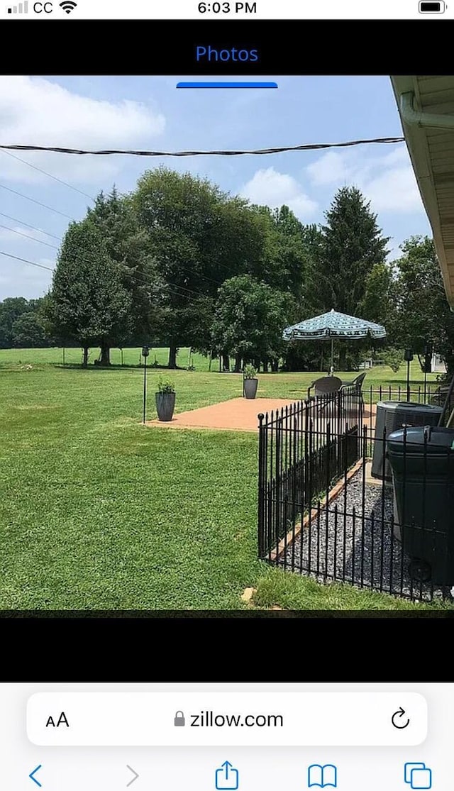 view of yard with fence