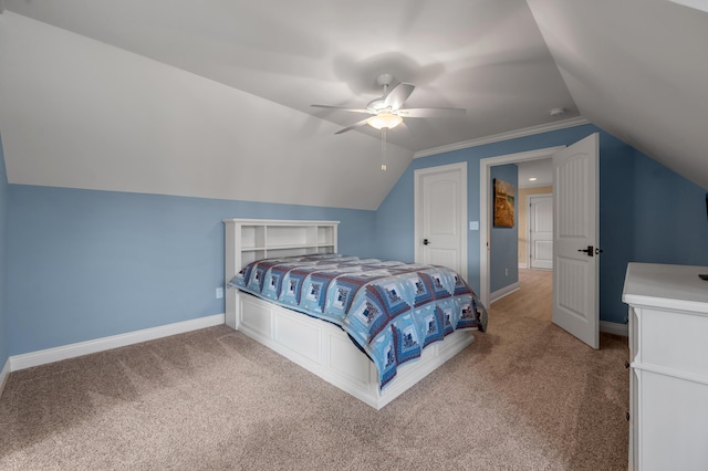 bedroom with lofted ceiling, ceiling fan, carpet, and baseboards