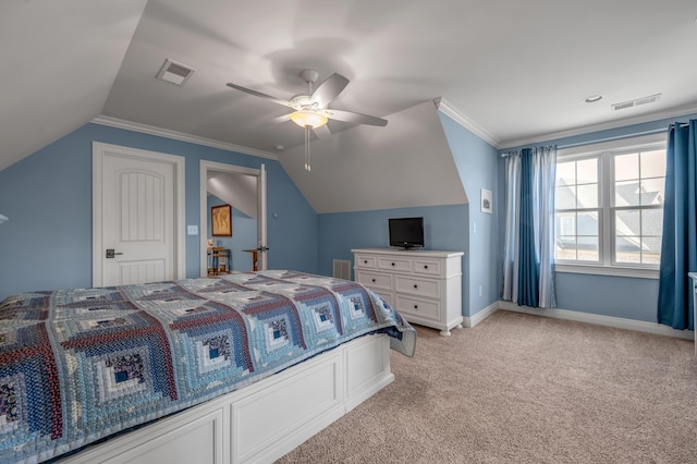 bedroom featuring lofted ceiling, light carpet, visible vents, baseboards, and crown molding