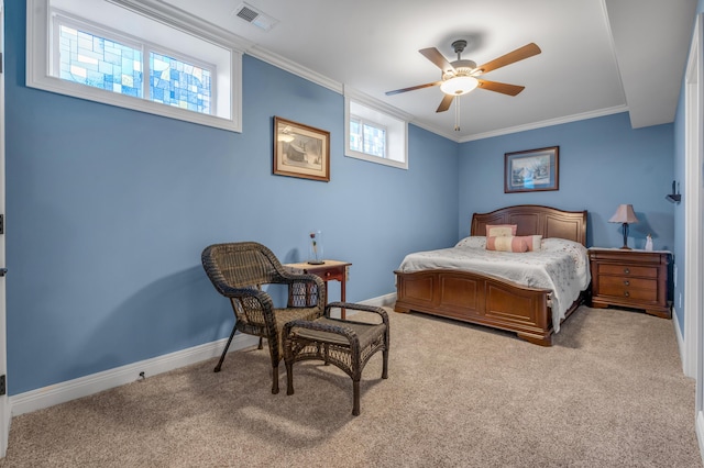 bedroom featuring baseboards, visible vents, ceiling fan, crown molding, and carpet floors