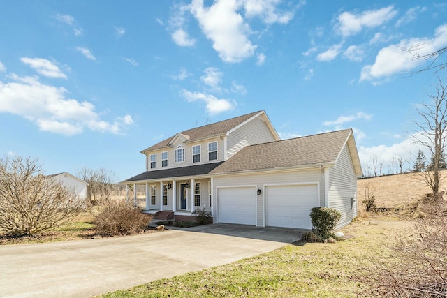 view of front of property featuring an attached garage, a shingled roof, and concrete driveway