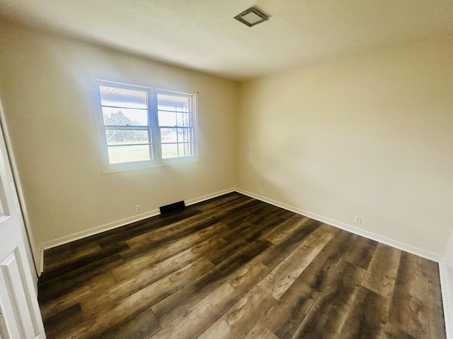 943 Helvetia Rd, London, KY 40741 - empty room featuring dark wood-style flooring and baseboards