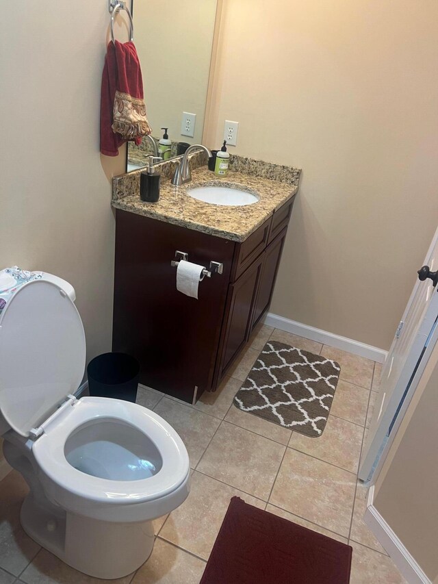 full bath featuring tile patterned floors, shower / tub combo with curtain, and toilet