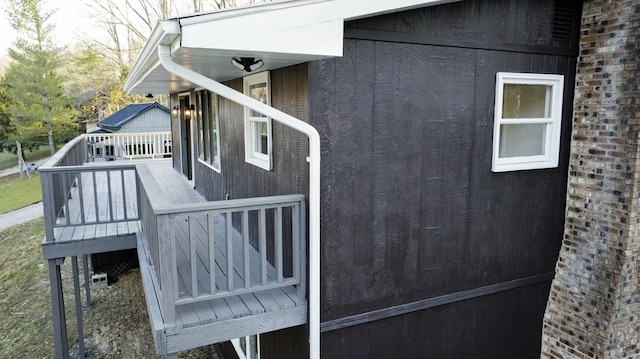 view of home's exterior featuring a wooden deck