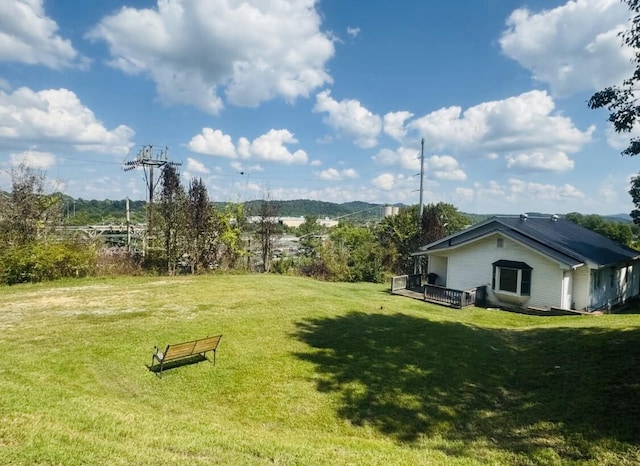 view of yard featuring a deck