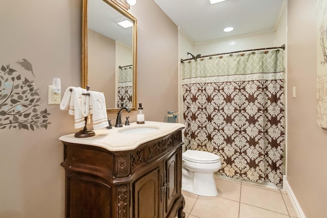 bathroom with a shower with curtain, vanity, toilet, and tile patterned floors