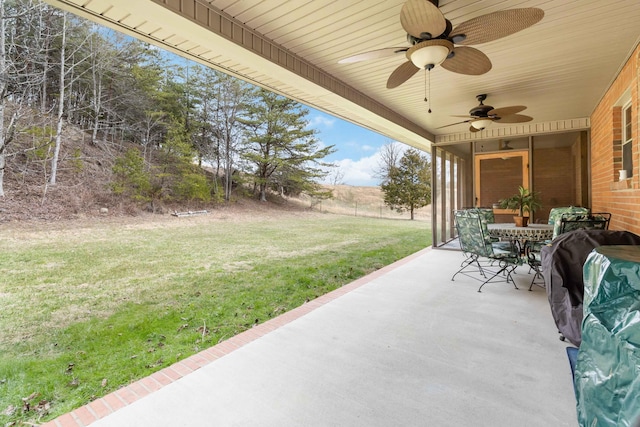 view of patio / terrace featuring ceiling fan and grilling area