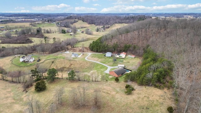 birds eye view of property featuring a rural view