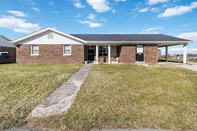 single story home with brick siding, an attached carport, driveway, and a front lawn