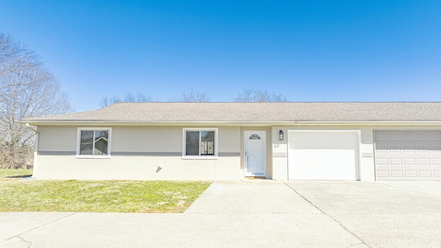 ranch-style house featuring stucco siding, driveway, a shingled roof, a front yard, and an attached garage