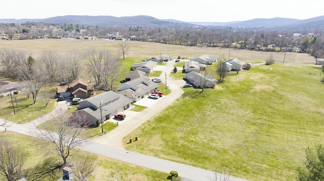 aerial view featuring a rural view, a mountain view, and a residential view