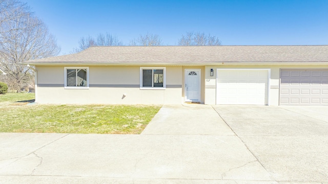 ranch-style house with stucco siding, concrete driveway, and a front yard