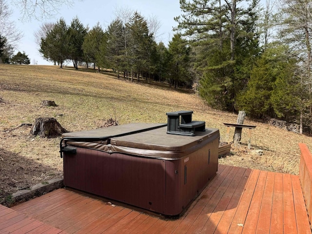 deck with a hot tub