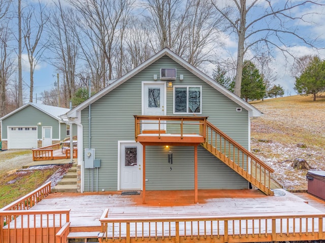 185 Woods Rd, Nancy, KY 42544 - rear view of property with an outbuilding, a detached garage, a deck, and stairs