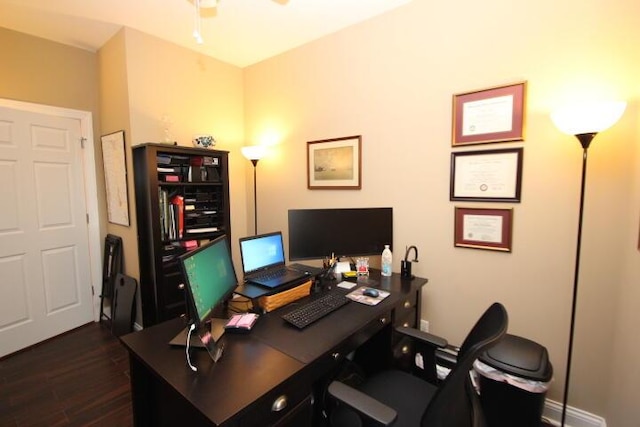 home office featuring dark wood-style floors and a ceiling fan