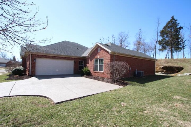 ranch-style house with brick siding, a front yard, central AC, a garage, and driveway