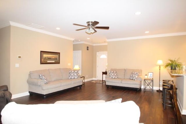 living room featuring baseboards, recessed lighting, wood finished floors, and crown molding