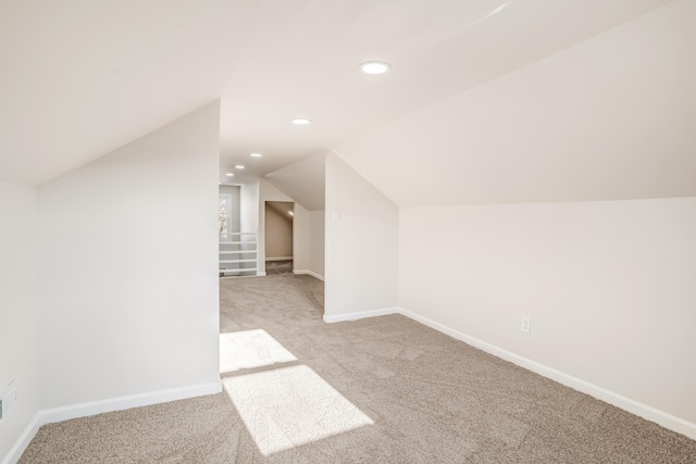 bonus room with carpet floors, recessed lighting, baseboards, and lofted ceiling