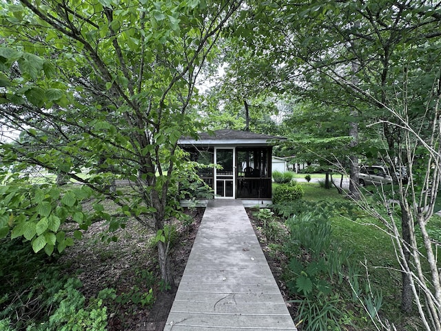 exterior space with a sunroom