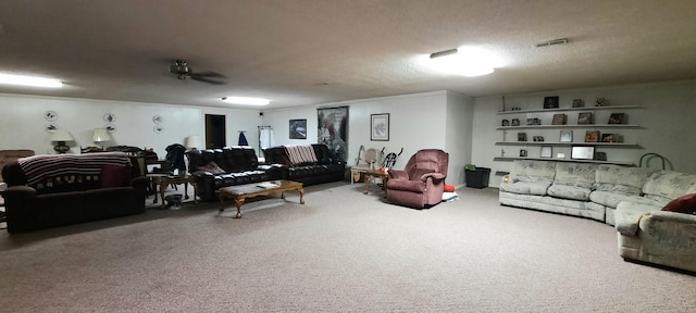 carpeted living room featuring a textured ceiling, visible vents, and a ceiling fan