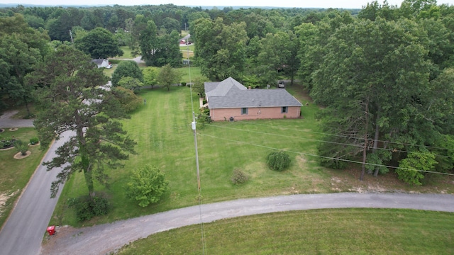 bird's eye view featuring a view of trees