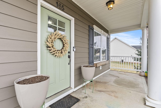 entrance to property with a porch