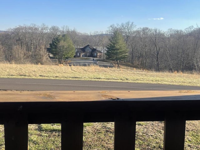 view of yard with a forest view