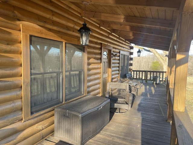 wooden terrace featuring a porch