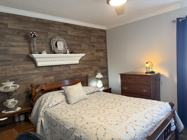 bedroom featuring ceiling fan and ornamental molding