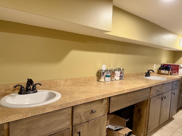 bathroom with vanity and tile patterned flooring