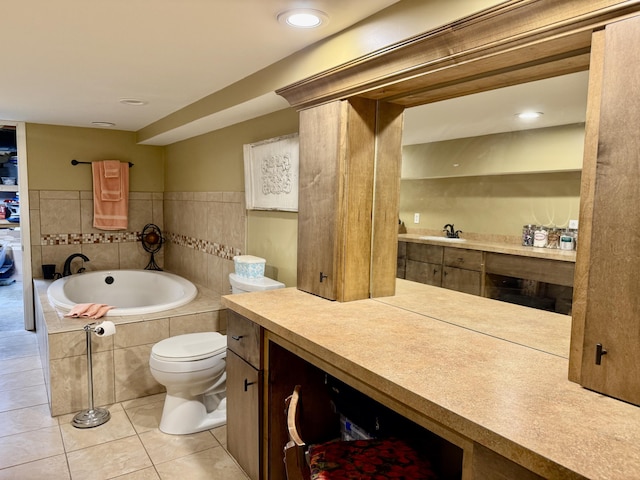 bathroom with vanity, a bath, recessed lighting, tile patterned floors, and toilet