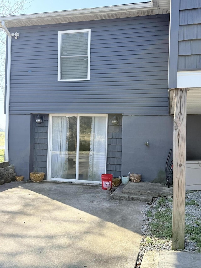 back of house featuring a patio