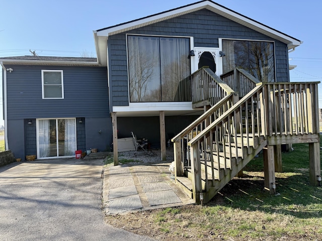 rear view of house with stairway