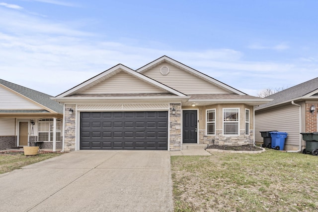 ranch-style house featuring concrete driveway, stone siding, an attached garage, and a front yard