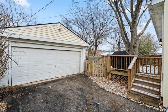 detached garage with fence