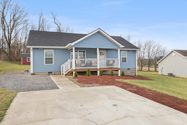 bungalow-style house with a porch, crawl space, a front yard, and a shingled roof