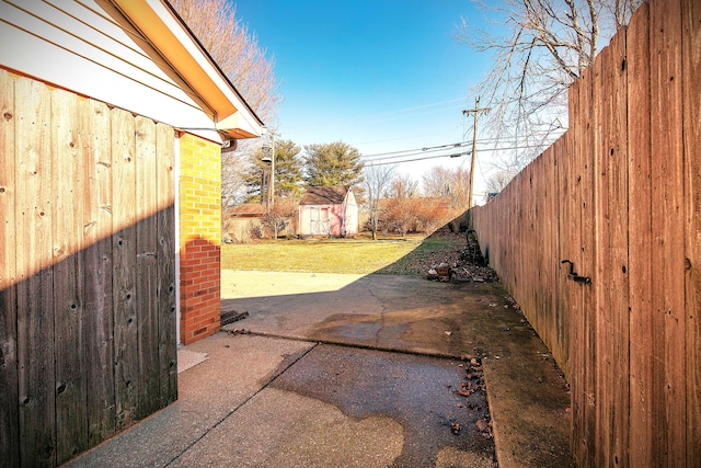 view of yard with a patio and fence