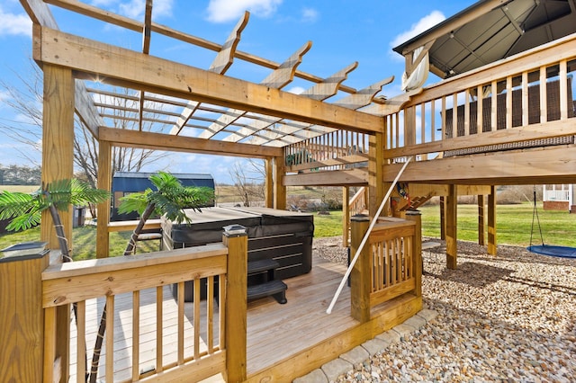 deck featuring stairs, a hot tub, and a pergola