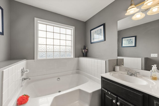 full bathroom featuring a bath and vanity