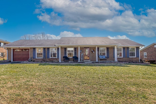 single story home featuring aphalt driveway, a garage, brick siding, a shingled roof, and a front lawn