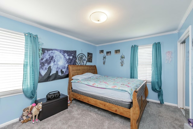 bedroom featuring ornamental molding, carpet flooring, and baseboards