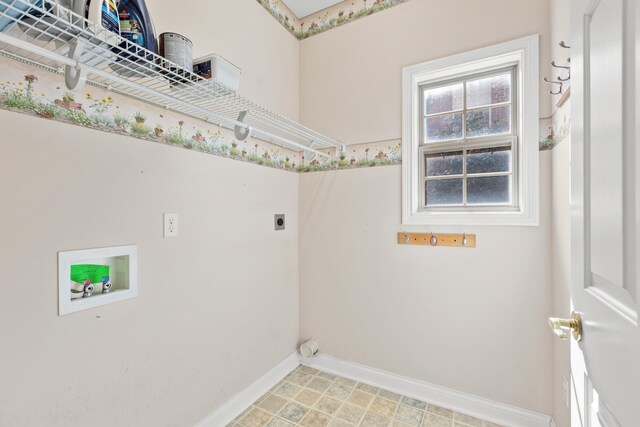 clothes washing area featuring laundry area, hookup for a washing machine, baseboards, and electric dryer hookup